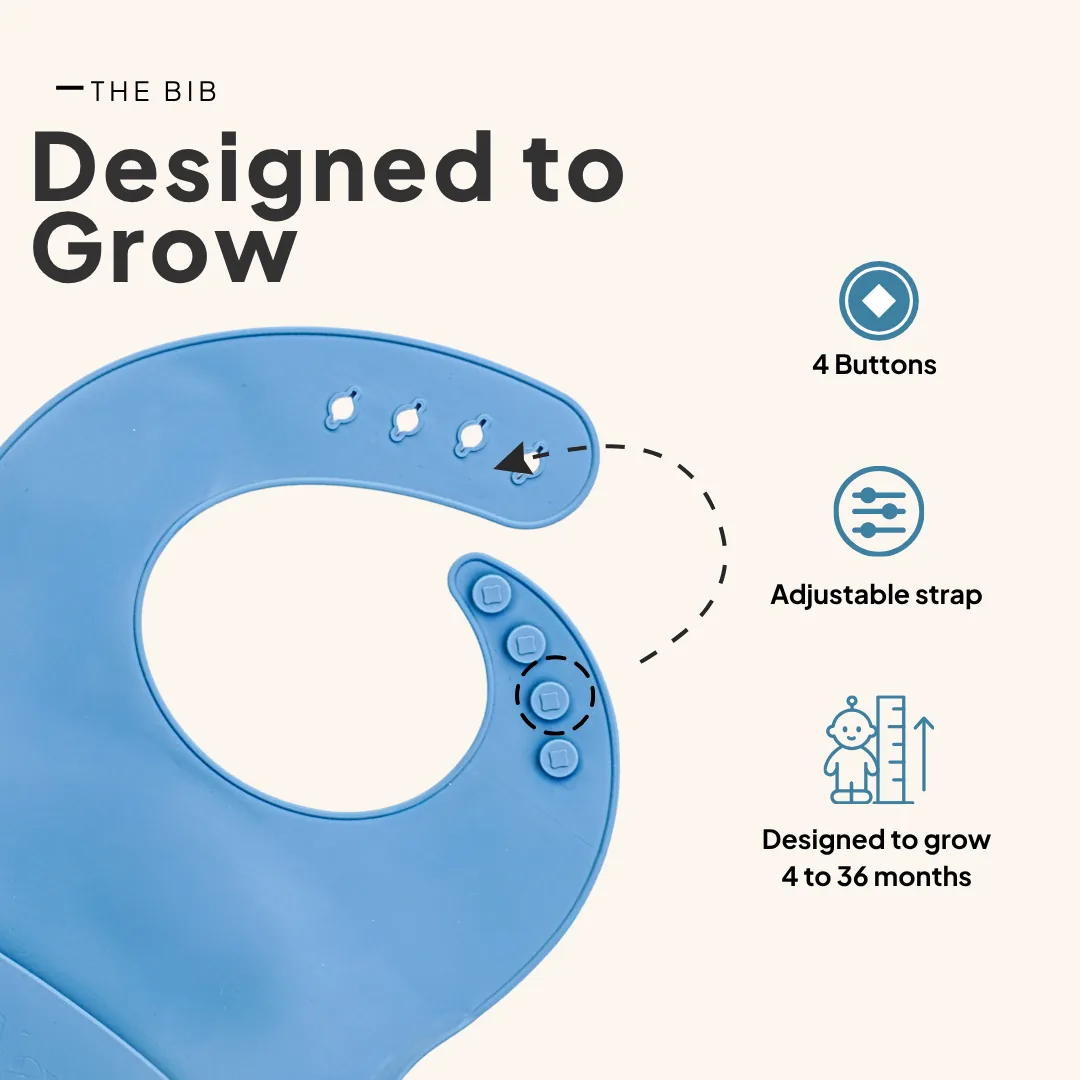 Slate Blue & Checkered KAYA bib showing four snap buttons and an adjustable strap, designed to grow from 4 to 36 months